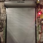 Porte d'acier roulante